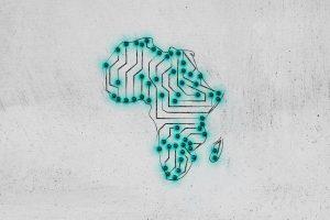 la carte de l'afrique représentée sous forme de circuit électrique sur un mur blanc